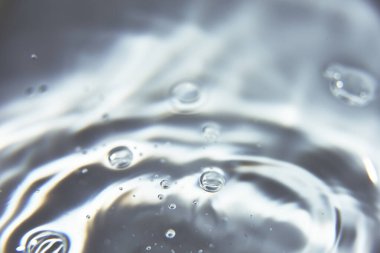 Çeşitli tonlar ve dalgalar, duvar kağıtları ile tanımlanmamış şekillerin soyut bir arkaplanı. Eşmerkezli daireler, delilik, tanımlanmamış şekiller, dalgalar, mavi, morumsu, morumsu, mavi, morumsu, yeşil