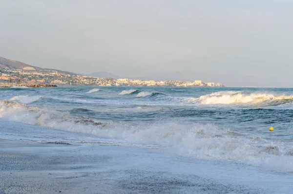 stock image Rough seas during a storm, seen from Fuengirola beach, Costa del Sol, Andalusia, southern Spain