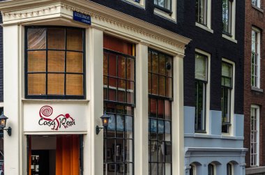 AMSTERDAM, THE NETHERLANDS - AUGUST 24, 2013: Urban landscape, view of streets and typical Dutch architecture in the historical center of Amsterdam, the Netherlands