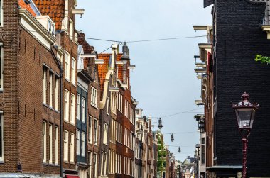 Urban landscape, view of streets and typical Dutch architecture in the historical center of Amsterdam, the Netherlands