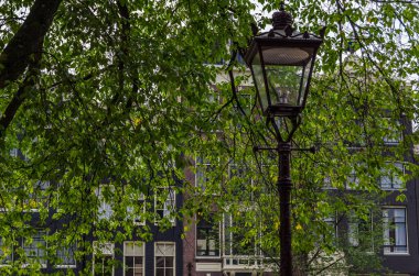 Urban landscape, view of streets and typical Dutch architecture in the historical center of Amsterdam, the Netherlands