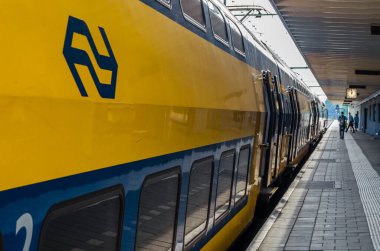 DEN HELDER, THE NETHERLANDS - AUGUST 25, 2013: Dutch train at the train station in Den Helder, North Holland province, the Netherlands