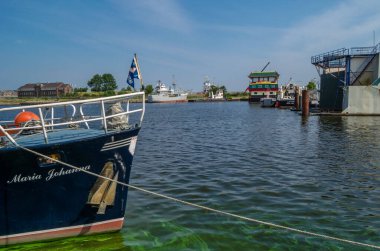 DEN HELDER, THE NETHERLANDS - AUGUST 25, 2013: Ships in the port of Den Helder, North Holland province, The Netherlands