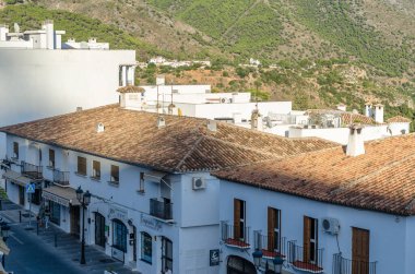 MIJAS, SPAIN - OCTOBER 9, 2021: View of streets and typical architecture in the town of Mijas, located on the Costa del Sol, Malaga province, Andalusia, southern Spain