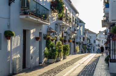 MIJAS, SPAIN - OCTOBER 9, 2021: View of streets and typical architecture in the town of Mijas, located on the Costa del Sol, Malaga province, Andalusia, southern Spain