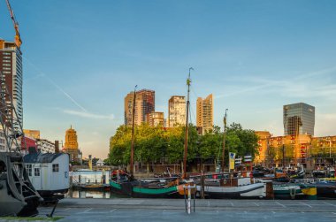 ROTTERDAM, THE NETHERLANDS - AUGUST 26, 2013: Exterior view from the Maritime Museum in the Maritime District of Rotterdam, the Netherlands. The Maritime District was originally a port area, now being transformed into a living area