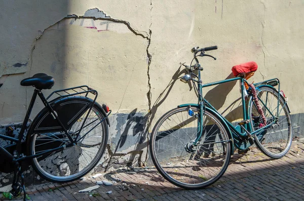 Bicycles leaning against a wall in Utrecht, the Netherlands