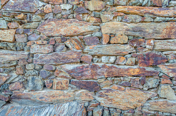 Architecture detail in the town of Patones de Arriba, Spain, one of the most representative examples of so-called black architecture (uses slate as the main construction element, a mineral compound of gray, violet, bluish, brown, silver or blackish t