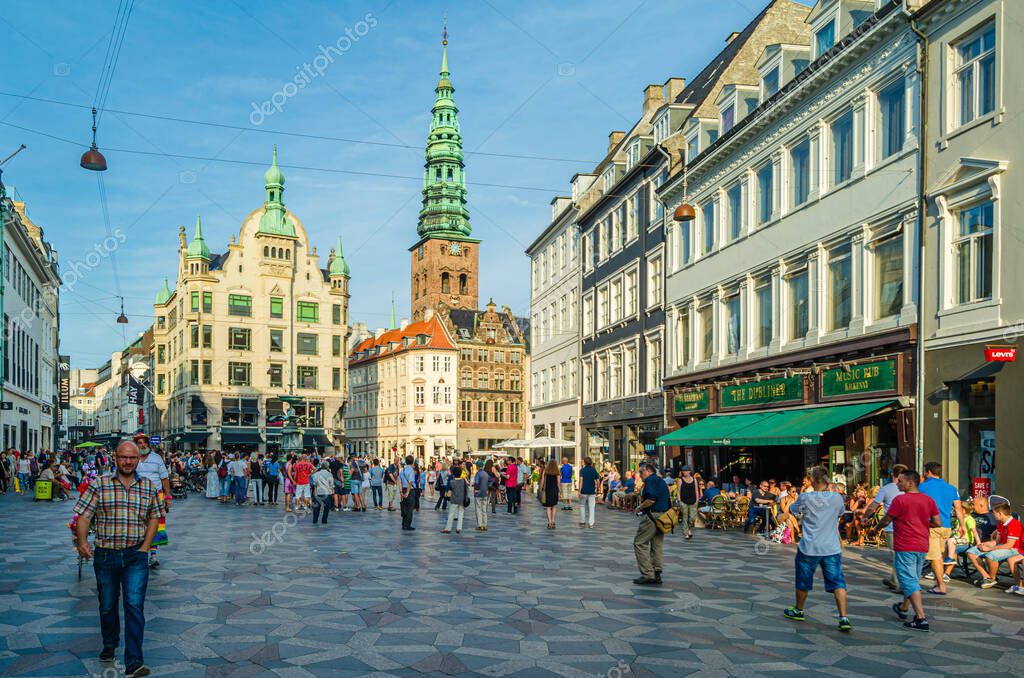 COPENHAGEN, DENMARK - JULY 8, 2014: View of a pedestrian, shopping street in Copenhagen, Denmark