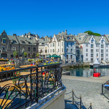 ALESUND, NORWAY - JULY 19, 2014: View of buildings in Alesund, More og Romsdal County, Norway, city known for Art Nouveau architecture clipart