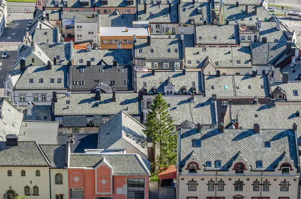 Architectural detail, top view of building roofs in Alesund, Norway