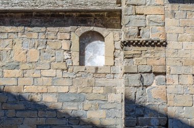 Architectural detail of the Cathedral of Saint Peter in Jaca, Huesca province, Aragon, northeastern Spain. It is one of the most characteristic and oldest Romanesque buildings in Spain, built between 1077-1130 clipart