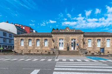 SAN CIBRAO (SAN CIPRIAN), SPAIN - AUGUST 28, 2022: Facade of the Provincial Museum of the Sea in the maritime village of San Cibrao (San Ciprian), Lugo province, Galicia, Spain clipart