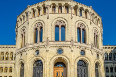 OSLO, NORWAY - JULY 10, 2014: The Storting building in Oslo, the seat of the parliament of Norway, designed by the Swedish architect Emil Victor Langlet, it was taken into use in 1866 clipart