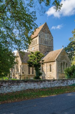 View of St Lawrence's Church, Anglican temple in the village of Castle Rising, Norfolk, England clipart