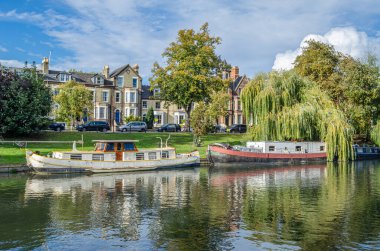 Cityscape on the banks of the River Cam in Cambridge, United Kingdom clipart