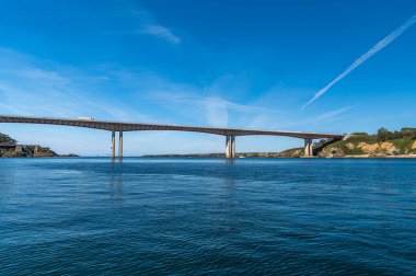 View of the Bridge of the Saints (Puente de los Santos) which connects Asturias with Galicia over the Eo estuary, northern Spain clipart