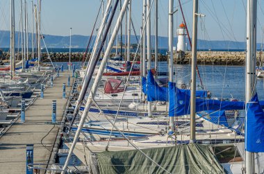 TRONDHEIM, NORWAY - JULY 23, 2014: Boats in the marina of Trondheim, Norway clipart