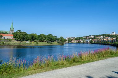 View of the Nidelva River passing through the city of Trondheim, Norway clipart