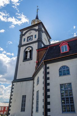 Roros Church (or Bergstadens Ziir), landmark in the mining town of Roros, Trondelag county, Norway. The octagonal, whitewashed stone church was built in 1784 clipart