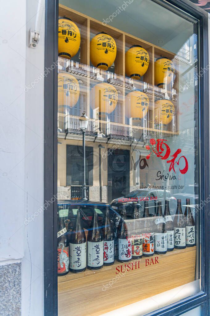 MADRID, SPAIN - NOVEMBER 6, 2022: Facade of a Japanese restaurant in Madrid, Spain, specialized in sake, tapas and sushi bar