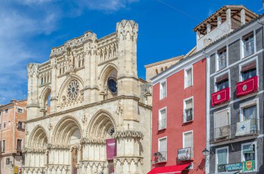 CUENCA, SPAIN - MARCH 29, 2015: Buildings in the old town of Cuenca, Castilla la Mancha, Spain, with their facades decorated during Holy Week