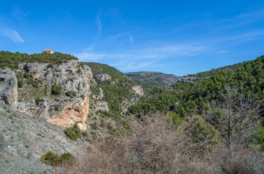 View of the Jucar River in the Serrania de Cuenca Natural Park, Castilla la Mancha, Spain, an example of karst erosion on limestone rock