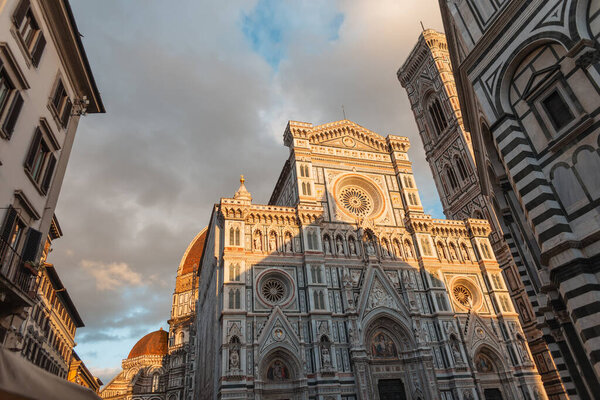 Old town with vintage gothic architecture renaissance cathedral at sunset in Florence, Italy