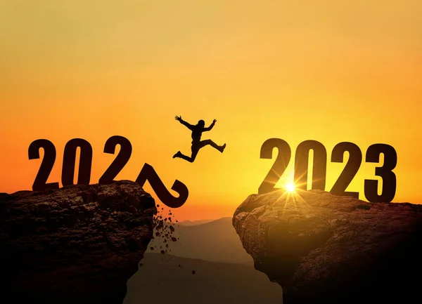 Man Jumping Cliff 2023 Precipice Stones Amazing Sunset New Year —  Fotos de Stock