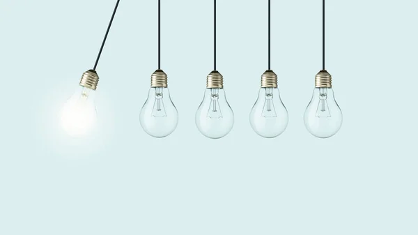 Creative light bulb lights up other extinguished light bulbs, concept.  Leadership, creative idea. Think differently. Start up