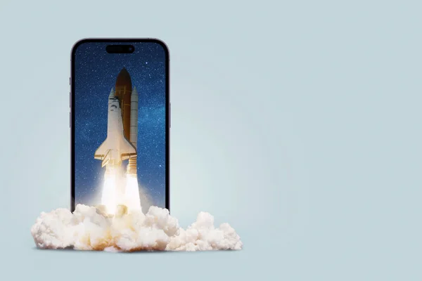 Space rocket overflow lift off from smartphone with cloud of smoke, creative idea. Application and marketing, advertising, concept. Acceleration and successful startup. Successful launch