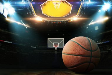 Basketbol topunu basketbol sahasında, halka ve projektörlü, konsept. Basketbol şampiyonası, yaratıcı fikir. Kazanmak. Spor kartı basketbol turnuvası