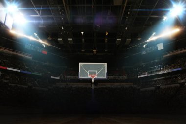 Basketbol arenasında projektörlü basketbol potası, yaratıcı bir fikir. Spor oyunu, konsept. Kazandım. Basketbol şampiyonluğu
