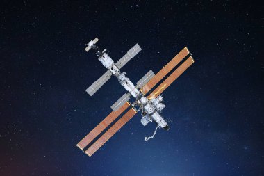 UUİ uzay istasyonu yıldızlı uzayda uçuyor ve uzayın derinliklerine iniyor. Uzay görevi ve UUİ. İletişim ve teknoloji. Bilim, kavram