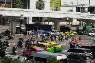 Bangkok, Thailand - November 26, 2024: interception road traffic jam in rush hour at evening on bangkok road clipart