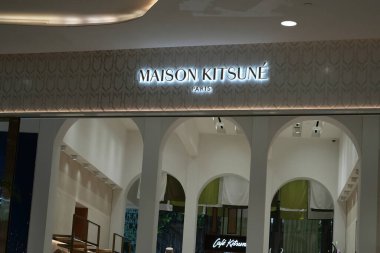 Bangkok, Thailand - November 26, 2024: Maison Kitsune store in Bangkok at department store mall clipart