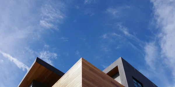Modern building edges and blue sky
