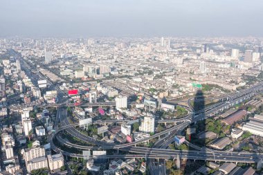 Bad air pollution in City. PM 2.5 dust in Bangkok or center city, Capital city are covered by heavy smog, Misty morning and sunrise in downtown with bad air pollution, Place to risk of cancer,Thailand