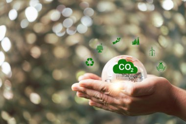 Sürdürülebilir CO2 kavramları geliştirmek ve küresel ısınma ve iklim değişikliğini sınırlamak için düşük CO2 emisyonları ve karbon ayak izi azaltmak. sürdürülebilir çevre yönetimi, yenilenebilir enerjiden sera