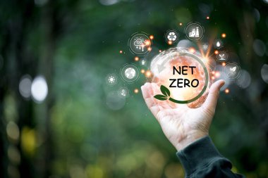 2050 yılına kadar küresel ısınmayı hedeflemek için sıfır sera gazı emisyonu elde etme hedefi. Karbon nötr ve net sıfır. Çevre Bir iklim, ikon sürdürülebilir toprak elde ve yeşil arkaplan.