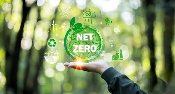 Concept of goal to net zero greenhouse gas emissions by 2050 to targets global warming. Carbon neutral and net zero. environment A climate, icon sustainable earth on hand and green background.