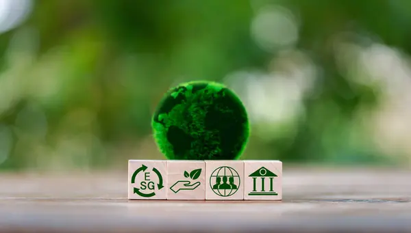 Investing in the environment, society, governance. ESG Investing in the industrial. Green energy invest instead gold coins growing. Concept of Savings in ESG Mutual Funds, Sustainable Business.