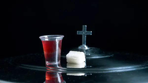 Eucharist or holy Communion of christianity concept. Eucharist is sacrament instituted by Jesus. during last supper with disciples. Bread and wine is body and blood of Jesus Christ of Christians.