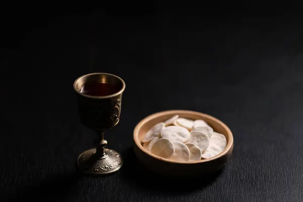 Stock image Christian religion, believers partake in Holy Communion, sacred eucharist sacrament symbolizing bread and blood of Christ, deepening their spirituality and faith. communion, christian, holy, religion