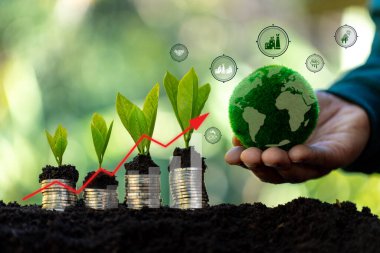 Ekonomi büyümeye ve daha fazla para üretmeye devam ettikçe yeşil finans simgesi iş büyümesini, ekonomik kalkınmayı ve finansal refahı sembolize ediyor.