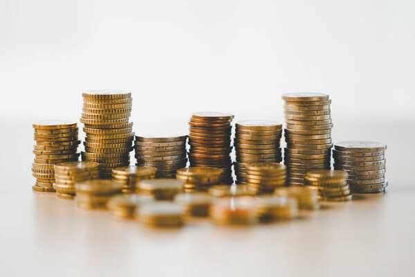 Finance and banking, saving coins, cash, gold while making smart investments in business, currency can build wealth, increase profit, achieve financial success that adds value to overall economy.