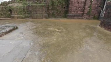 Damaged Granite Brick Wall Tower Of Ancient Ruined Fort