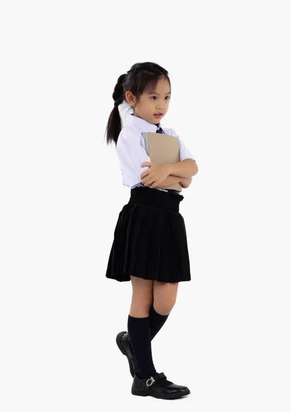 学校に戻る アジアの女子高生で英国の国際制服保持本上の白い背景フル長さ — ストック写真