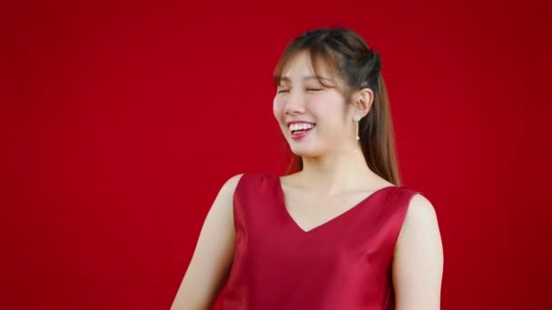 Beautiful Asian Woman Long Hair Red Dress Posing Red Background — Stockvideo