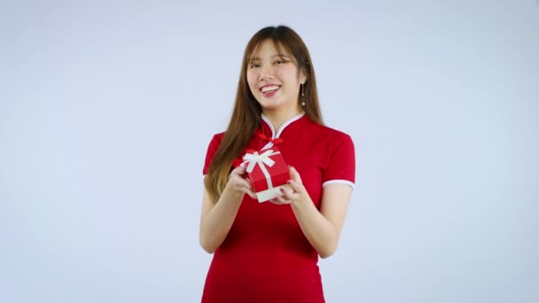 Video Young Pretty Asian Woman Holding Red Gift Box White — Stock Video